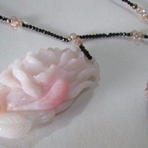 "A rose by any other name is still a Rose" especially this beauty Pink Opal